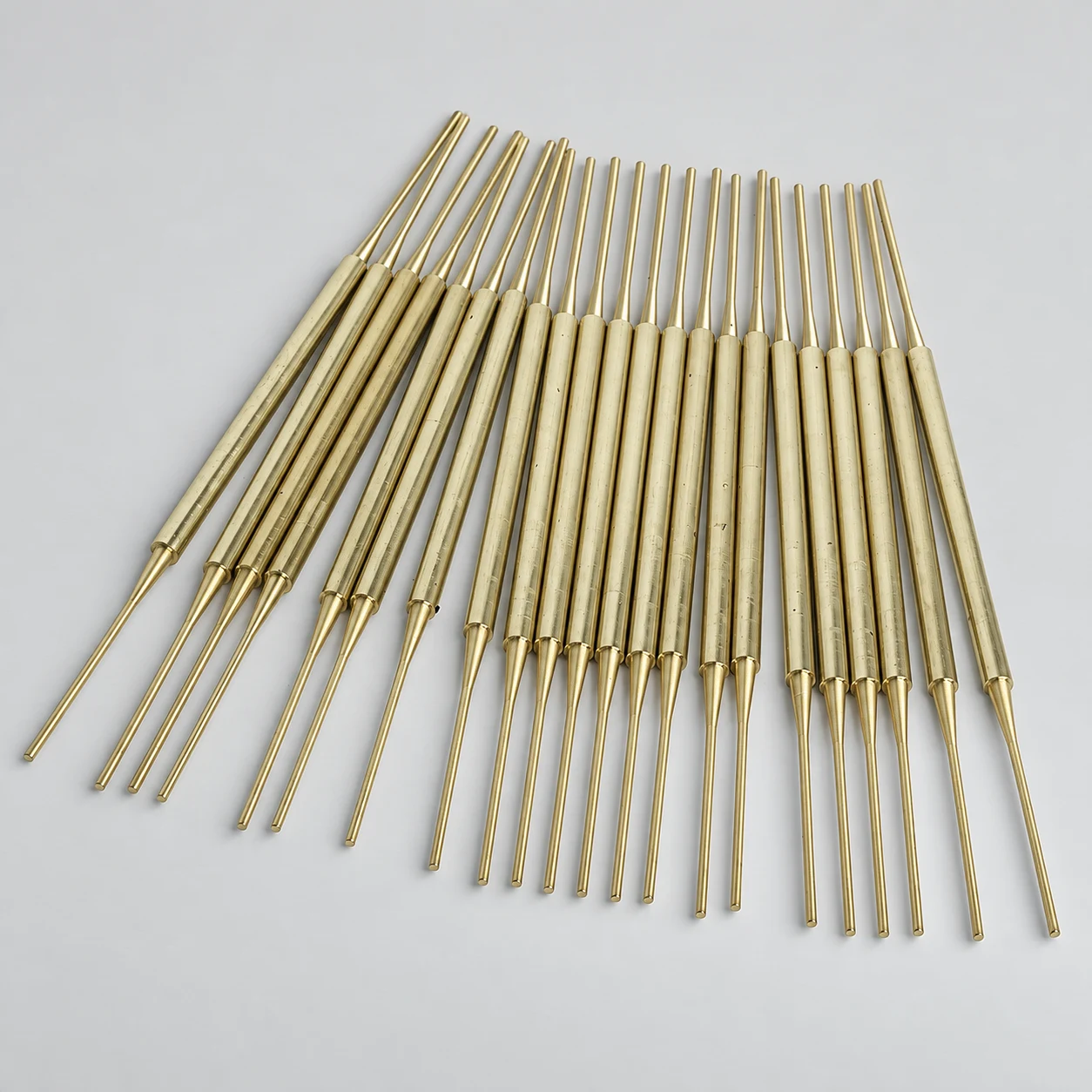 Brass thimble pin — AI-assisted studio presentation based on the original Chengshuo photograph
