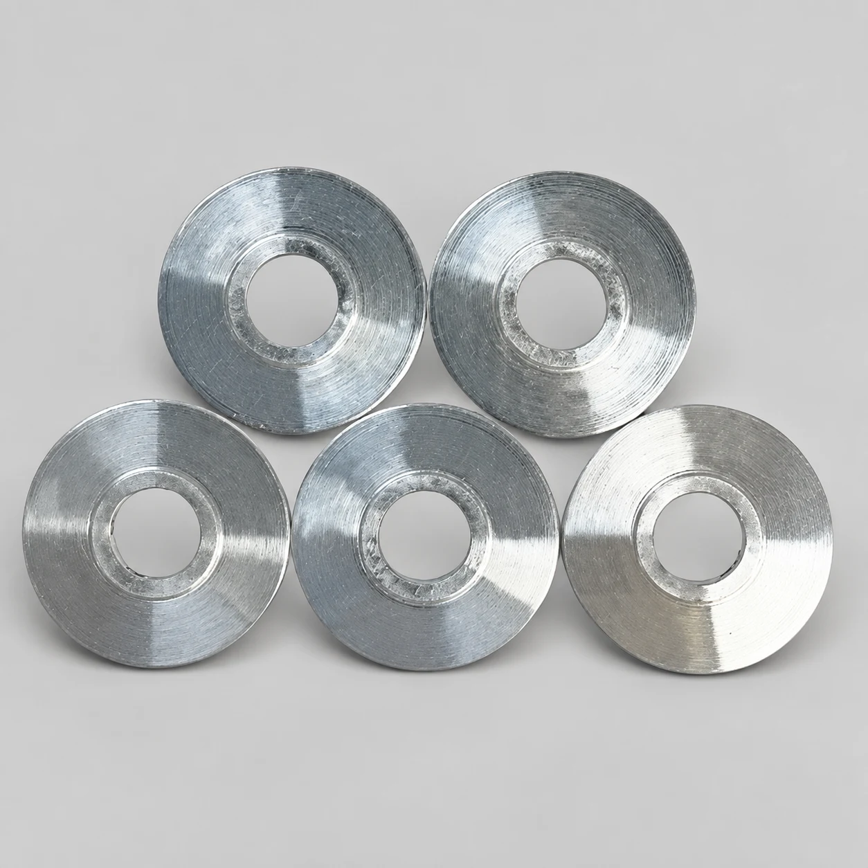 Aluminum round washer — AI-assisted studio presentation based on the original Chengshuo photograph