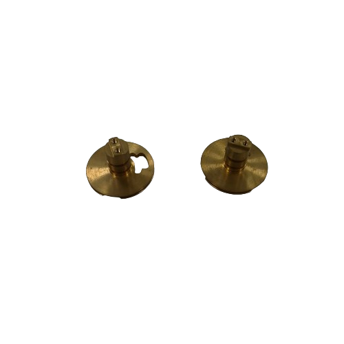 Original Chengshuo photograph of two brass valve-component forms with discs and central stems, one with a disc cutout