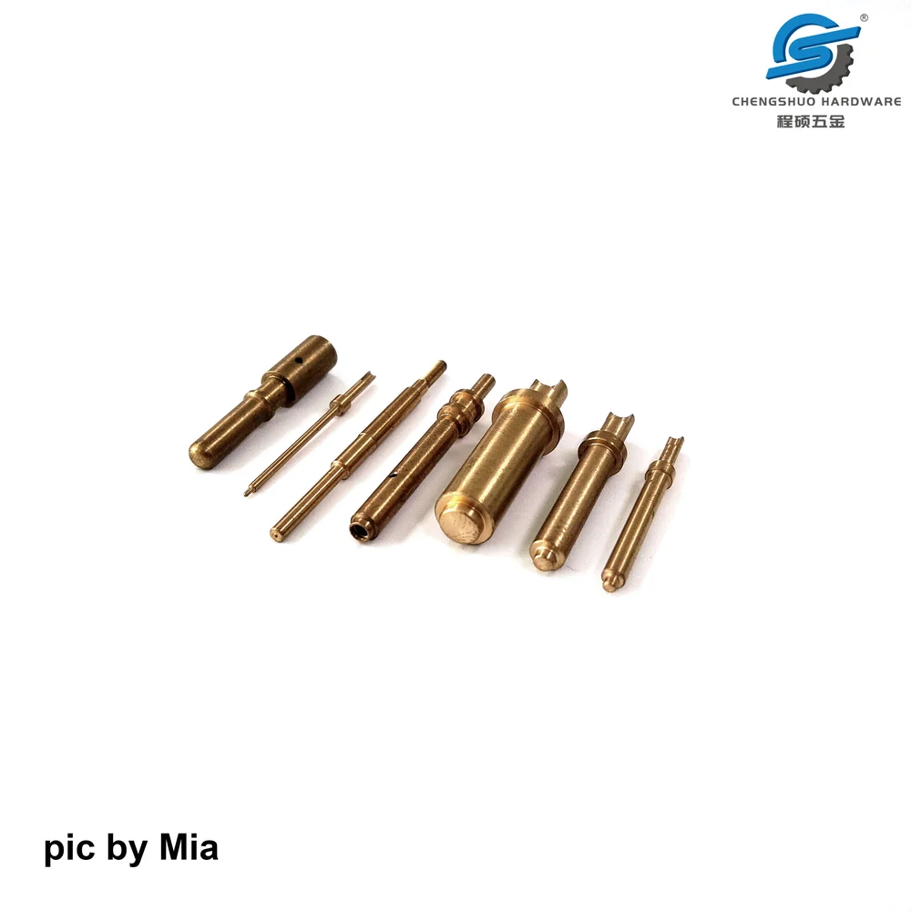 Chengshuo original photograph of a brass contact-component series with stepped diameters and end features